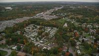 5.5K stock footage aerial video flying by mobile home park, stores, autumn, Salem, New Hampshire Aerial Stock Footage | AX152_082