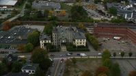 5.5K stock footage aerial video flying by a condominium complex and busy street, autumn, Lowell, Massachusetts Aerial Stock Footage | AX152_141