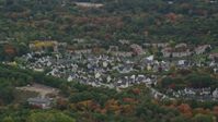 5.5K stock footage aerial video of suburban homes among fall foliage, Walpole, Massachusetts Aerial Stock Footage | AX152_229