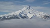 5.5K stock footage aerial video of low clouds and Mount Hood, Cascade Range, Oregon Aerial Stock Footage | AX154_110
