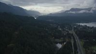 5.5K stock footage aerial video flying over forest by Interstate 84, Cascade Locks, Oregon in Columbia River Gorge Aerial Stock Footage | AX154_168