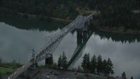 5.5K stock footage aerial video of Traffic crossing Bridge of the Gods in Cascade Locks, Columbia River Gorge, Oregon Aerial Stock Footage | AX154_173