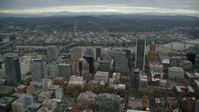 5.5K stock footage aerial video flying by skyscrapers and high-rises near the Willamette River in Downtown Portland, Oregon Aerial Stock Footage | AX155_110