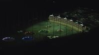 5.5K stock footage aerial video slowly flying by a Topgolf course in Hillsboro, Oregon at night Aerial Stock Footage | AX155_476