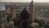 4.8K stock footage aerial video flying away from Promenade II revealing cluster of skyscrapers, Midtown Atlanta Aerial Stock Footage | AX39_025