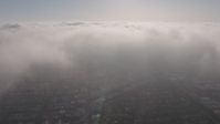4K stock footage aerial video of sunlit marine layer clouds over Los Angeles, California Aerial Stock Footage | AX43_055