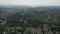 5K stock footage aerial video fly over suburban neighborhoods with trees, Brier, Washington Aerial Stock Footage | AX46_011