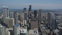 5K stock footage aerial video fly by tall skyscrapers and city buildings in Downtown Seattle, Washington Aerial Stock Footage | AX47_096
