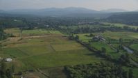 5K stock footage aerial video of rural farms and fields in Carnation, Washington Aerial Stock Footage | AX49_016