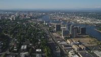 5K stock footage aerial video wide view of city sprawl, skyscrapers, and river, South Waterfront and Downtown Portland, Oregon Aerial Stock Footage | AX53_059