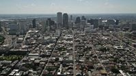 5K stock footage aerial video follow Bourbon Street through French Quarter to approach Downtown New Orleans, Louisiana Aerial Stock Footage | AX59_006