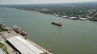 5K stock footage aerial video of an oil tanker sailing on Mississippi River, New Orleans, Louisiana Aerial Stock Footage | AX59_055