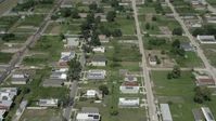 5K stock footage aerial video fly over homes and empty lots in the Lower Ninth Ward, New Orleans, Louisiana Aerial Stock Footage | AX59_058