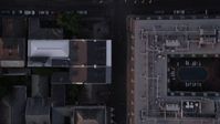 5K stock footage aerial video of looking down on Bourbon Street in New Orleans' French Quarter, Louisiana at twilight Aerial Stock Footage | AX61_049