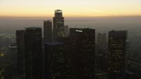 5K stock footage aerial video of US Bank Tower and skyscrapers, Downtown Los Angeles, California, twilight Aerial Stock Footage | AX64_0212