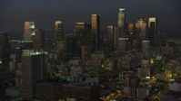 5K stock footage aerial video of Downtown Los Angeles high-rises reflecting the twilight, California Aerial Stock Footage | AX64_0229