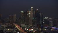 5K stock footage aerial video of Downtown Los Angeles towers and 110 freeway, California, twilight Aerial Stock Footage | AX64_0235