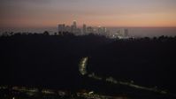 5K stock footage aerial video of Downtown Los Angeles skyline seen from Elysian Park, California, twilight Aerial Stock Footage | AX64_0257