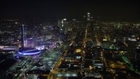 5K stock footage aerial video of Downtown Los Angeles skyscrapers, reveal Staples Center, California, night Aerial Stock Footage | AX64_0362