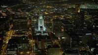 5K stock footage aerial video of passing Los Angeles City Hall, Downtown Los Angeles, California, night Aerial Stock Footage | AX64_0384