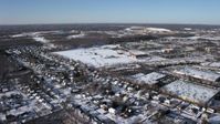 4.8K stock footage aerial video of State University of New York at Farmingdale, Long Island in snow Aerial Stock Footage | AX66_0002