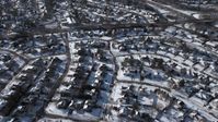 4.8K stock footage aerial video of suburban neighborhoods in snow, Syosset, New York Aerial Stock Footage | AX66_0013