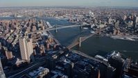 4.8K stock footage aerial video of Brooklyn Bridge and Manhattan Bridge, New York City Aerial Stock Footage | AX66_0140