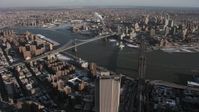 4.8K stock footage aerial video orbit the Brooklyn Bridge and Manhattan Bridge, New York City Aerial Stock Footage | AX66_0141