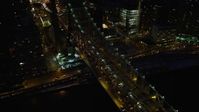 4.8K stock footage aerial video of Queensboro Bridge and Midtown Manhattan skyscrapers, New York City, night Aerial Stock Footage | AX66_0422