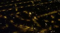 4.8K aerial video view of a bird's eye view of residential neighborhoods in Queens at night, New York Aerial Stock Footage | AX67_0114