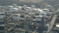 4.8K stock footage aerial video flyby tanks at the Los Angeles Refinery Wilmington Plant in San Pedro, California Aerial Stock Footage | AX68_173