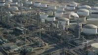4.8K stock footage aerial video of large tanks at Los Angeles Refinery Wilmington Plant in San Pedro, California Aerial Stock Footage | AX68_174