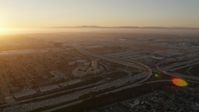 4.8K stock footage aerial video of Los Angeles International Airport at sunset in California Aerial Stock Footage | AX69_001