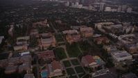 4.8K stock footage aerial video fly over Wilson Plaza, Dickson Court, and College campus buildings at twilight, Westwood, California Aerial Stock Footage | AX69_058
