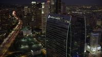 4.8K stock footage aerial video flyby the Ritz-Carlton Hotel to reveal skyscrapers in Downtown Los Angeles at night Aerial Stock Footage | AX69_094