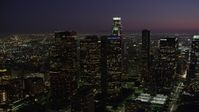 4.8K stock footage aerial video of skyscrapers in Downtown Los Angeles, California at night Aerial Stock Footage | AX69_103
