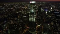 4.8K stock footage aerial video approach and orbit US Bank Tower in Downtown Los Angeles, California at nighttime Aerial Stock Footage | AX69_122