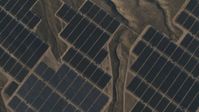 4K stock footage aerial video of A bird's eye of solar panels at the Topaz Solar Farm in the Carrizo Plain, California Aerial Stock Footage | AX70_057