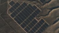 4K stock footage aerial video of A bird's eye view of solar panels at Topaz Solar Farm in the Carrizo Plain, California Aerial Stock Footage | AX70_058