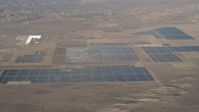 4K stock footage aerial video Large solar panels at the Topaz Solar Farm in the Carrizo Plain, California Aerial Stock Footage | AX70_060