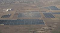 4K stock footage aerial video Large panels at the Topaz Solar Farm in the Carrizo Plain, California Aerial Stock Footage | AX70_061