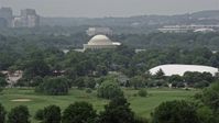 4.8K stock footage aerial video of the Jefferson Memorial and trees in West Potomac Park in Washington DC Aerial Stock Footage | AX74_066
