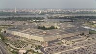 4.8K stock footage aerial video orbiting The Pentagon in Washington DC, with bridges over the Potomac in the background Aerial Stock Footage | AX75_128E