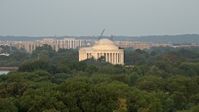 4.8K stock footage aerial video approaching the Jefferson Memorial with tourists, Washington D.C., sunset Aerial Stock Footage | AX76_059