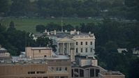 4.8K stock footage aerial video flying by The White House, reveal North Lawn Fountain, Washington D.C., sunset Aerial Stock Footage | AX76_077