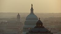 4.8K stock footage aerial video of the United States Capitol and Thomas Jefferson Building domes, Washington D.C., sunset Aerial Stock Footage | AX76_090E