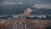 4.8K stock footage aerial video of tourists at the Jefferson Memorial in Washington D.C., sunset Aerial Stock Footage | AX76_107E