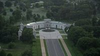 4.8K stock footage aerial video of the Women in Military Service for America Memorial, Arlington National Cemetery, Virginia, twilight Aerial Stock Footage | AX76_113