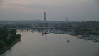 4.8K stock footage aerial video of Washington Monument and Francis Case Memorial Bridge, Washington, D.C., twilight Aerial Stock Footage | AX76_147