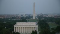 4.8K stock footage aerial video of the Washington Monument, National Mall, United States Capitol, Lincoln Memorial, Washington, D.C., twilight Aerial Stock Footage | AX76_153E